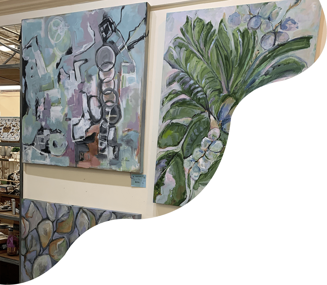 A painting of plants and rocks on the wall.